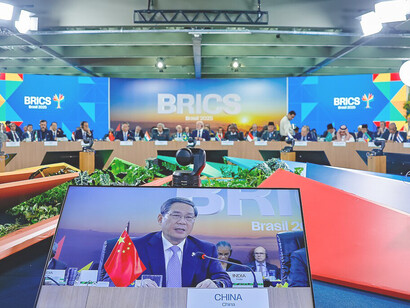Premier Li Qiang of the People’s Republic of China attends the plenary session “Environment, COP30, and Global Health” at the Museum of Modern Art (MAM) in Rio de Janeiro, Brazil