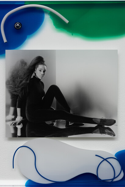 Elad Lassry, Untitled (Woman), 2015. Acrylic glass, silver gelatin print, wire, steel ball, pigment, 23 1/8 x 17 1/4 x 1 5/8 inches