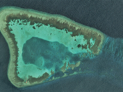The Spratly Islands, a disputed archipelago in the South China Sea, include islands, islets, cays, and over 100 reefs lying close to the Philippines, Malaysia, and southern Vietnam