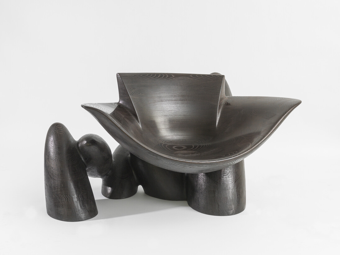 Captain's Chair, 2013, Stained Ash, 29 x 54.5 x 43 inches. Courtesy of Wendell Castle and Friedman Benda. Photography: Adam Reich