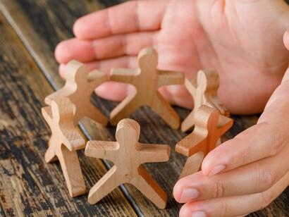 Hands guide the fragile architecture of human connection and group life