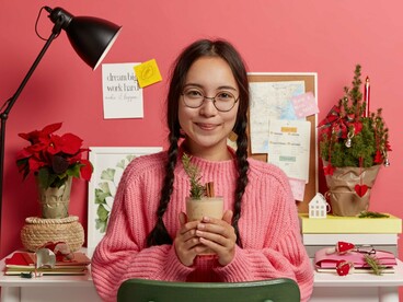 A young woman quietly enjoying her own company, representing the strength of developing an identity beyond social validation