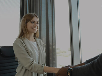 A determined woman, eager to secure the job, navigates through the interview process