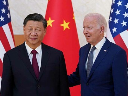 President Xi Jinping alongside President Joe Biden as the two smile for the press