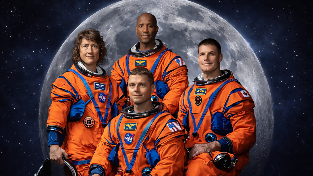 Reid Wiseman, Victor Glover, Christina Koch, and Jeremy Hansen, the crew of Artemis II, poised before the Moon as they prepare to resume humanity’s journey into deep space