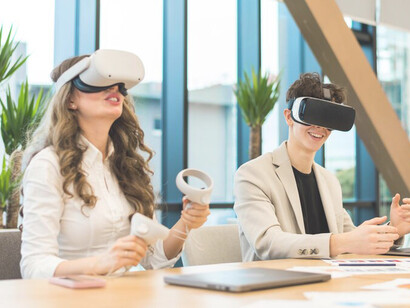 Architects at a business conference using VR headsets in a contemporary office environment