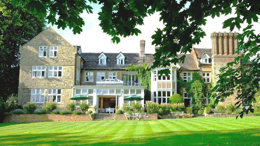 Ockenden Manor is set on eight acres of beautiful grounds overlooking Cuckfield Park