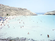 Massimo Vitali, Lampedusa, 2012, chromogenic print on Diasec, 185.4 x 236.2 cm, courtesy the artist and Ronchini Gallery