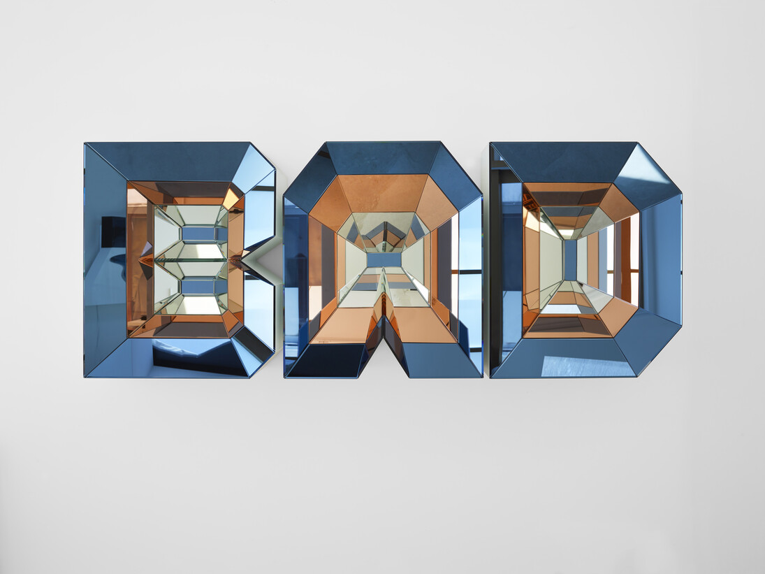 Doug Aitken, BAD, 2014, Glass, colored mirror glass and high-density foam, 32 x 82 x 11.5 inches (81.3 x 208.3 x 29.2 cm) © Doug Aitken. Courtesy Regen Projects, Los Angeles.