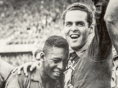 Young Pelé, Edson Arantes do Nascimento, crying of joy, with one of his team mates