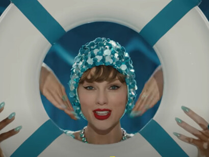 The couple shares a private moment surrounded by flowers after announcing their engagement