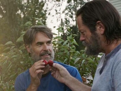 Frank and Bill toasting with strawberries in "The Last of Us" series