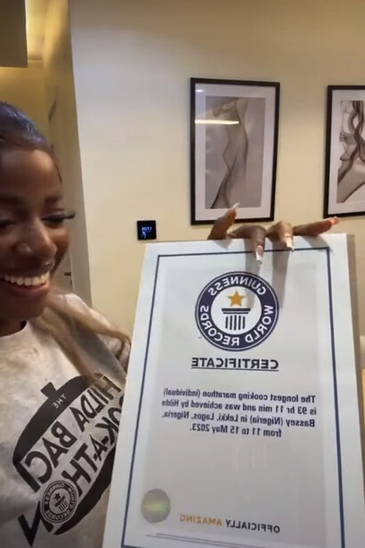 With great pride and honor, Chef Hilda Baci takes hold of the coveted certification from Guinness World Records