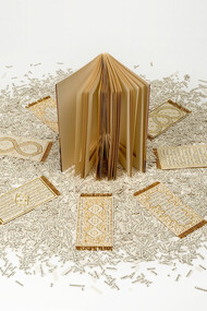 E disse, 2014. Libro intagliato (Erri De Luca, E disse, ed. Feltrinelli), migliaia di ritagli di carta stampata, ricamo, perline, colla, dimensioni variabili (libro h. 19,5 cm). Foto Rino Conobbi. Courtesy Passaggi Arte Contemporanea, Pisa
