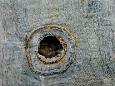 Caroline Mayers, Holes. Indigo-dyed cotton, iron wire, 2025