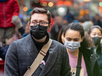 Nearly 100 million people have received at least one dose of a Covid-19 vaccine