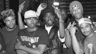A group of famous rappers from the 90s headlined by Tupak Shakur (center) that influenced the music genre