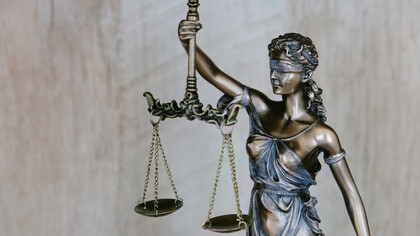 The statue of Justice stands as a symbol of the relentless pursuit of justice in Southeast Asia