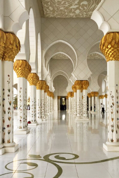 The Sheikh Zayed Grand Mosque in Abu Dhabi, UAE, is a breathtaking example of Islamic architecture, featuring 82 domes and over 1,000 columns