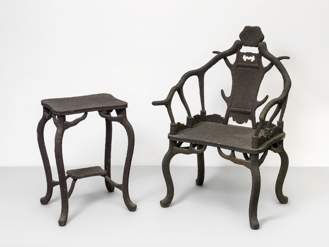 Zheng Guogu, Impacted Chairs, 2011, African ebony, Chair: 115 x 50 x 73 cm, 45 1/4 x 19 3/4 x 28 3/4 inches, Tea Table: 71 x 36 x 46 cm, 28 x 14 1/4 x 18 inches