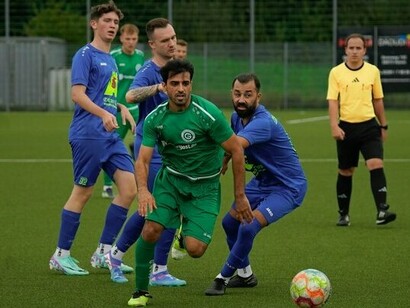 Players scramble for possession in a game, symbolizing the thrilling moments fans travel across continents to witness