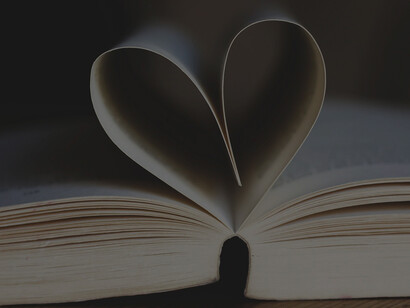 Heart shaped book pages on a table