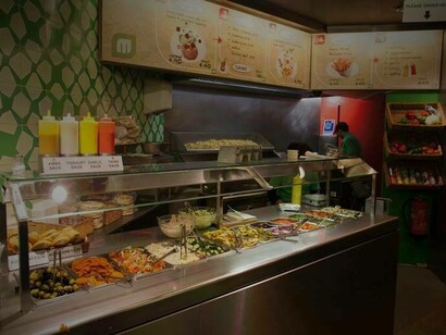 Inside the vegan restaurant Maoz Vegan, Amsterdam which is the perfect option if you are on a budget