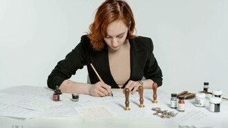 A woman writing down her memoir