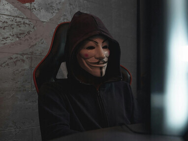 Darkroom hacker imagery reflects the covert nature of hybrid warfare operations