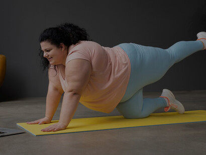 Empowering journey of an obese woman committed to her health, engaging in exercise to achieve her wellness goals, showcasing resilience and dedication in pursuit of a healthier lifestyle