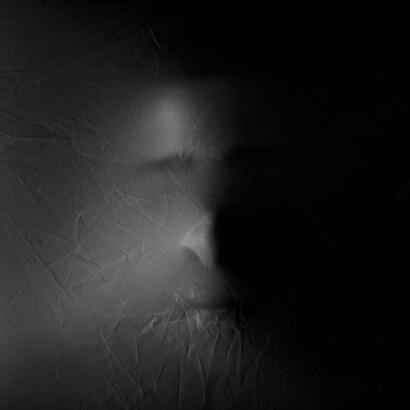 "I knew it was peering out from that obscure face, empty and mute"