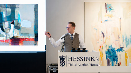 An auctioneer leads bidding during Hessink’s landmark contemporary art sale in Tbilisi, an event that marked a major turning point in the international recognition of Georgian modern and contemporary art, Georgia
