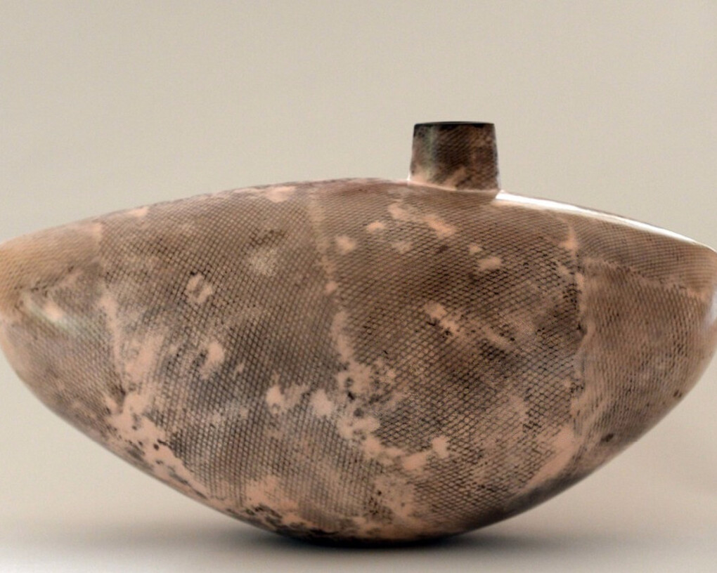 Alison Kay: Wide Pale Coral Vessel with Off Centre Opening, 2016. Ceramic. 9” x 16” x 7”. Courtesy of J. Cacciola Gallery W and the artist. 
