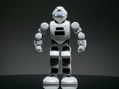 An AI robot shown as the face of innovation, conveying how visibility often eclipses architectural accountability