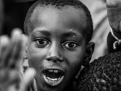 Every cheerful face tells a story of resilience and hope, proving that joy can thrive in the most challenging circumstances