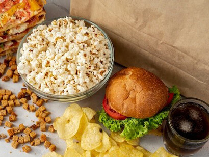 Fast foods, including burgers, pizza, and chips, are linked to obesity and the growing burden of health-related costs