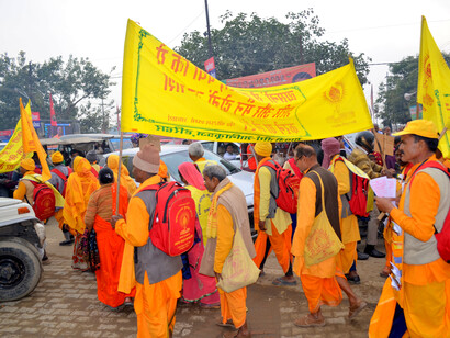 Devotees in the Kumbh area chanting religious songs
