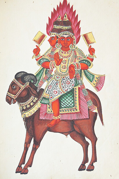 Agni, god of fire, shown riding a ram