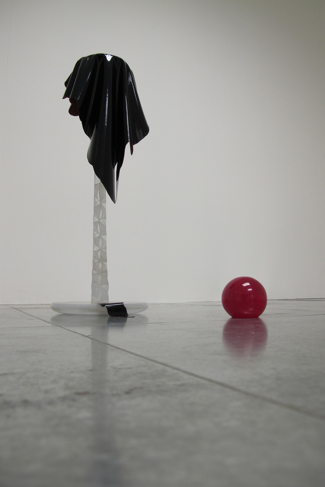 Nick Fox, Murmuring, 2009 - 2011, Sculpted, cut and polished glass, sheet of acrylic paint, 60 cm x 22 cm, Installation view, Vane, Newcastle  2013
