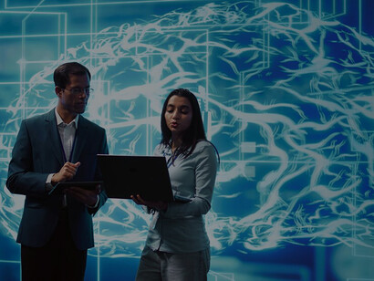 Man and woman exploring an AI hologram, examining ethical implications and their roles as active participants in shaping reality