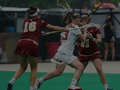 Women's College field hockey match between two rivaling schools in the USA