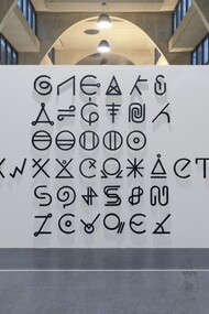 David Reimondo,installation view, symbols in wood impregneted with printer's ink 