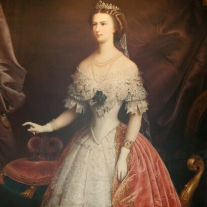 Empress Elisabeth of Austria draped in lace and regal finery epitomizes the meticulous grooming habits that made her an enduring icon of 19th-century style