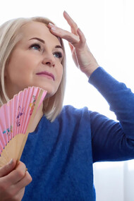 A woman experiencing perimenopause, reflecting hormonal transition and midlife health