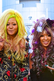 Four women dressed in vibrant gyaru fashion with dramatic makeup and statement accessories, reflecting unapologetic self-expression