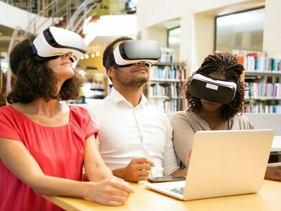 Students putting on VR headsets, engaging in AI-enhanced education to cultivate their polymathic thinking skills