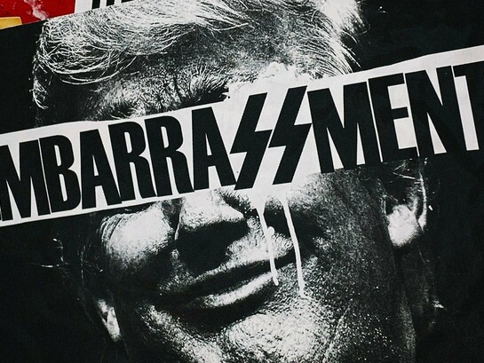 A portrait of Trump beneath the word “embarrassment,” representing the growing disgrace surrounding his leadership