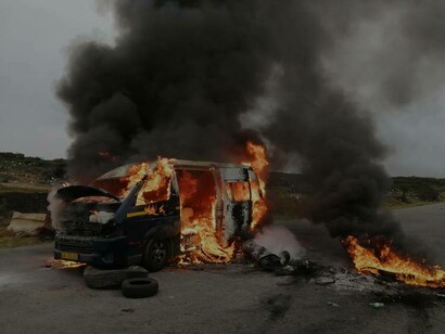 A Toyota Quantum was torched on Old Uitenhage Road by protesting taxi drivers in South Africa
