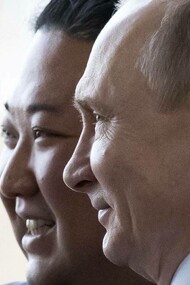 Russia's President Vladimir Putin posing for a photo-op with the Supreme Leader of North Korea Kim Jong-Un