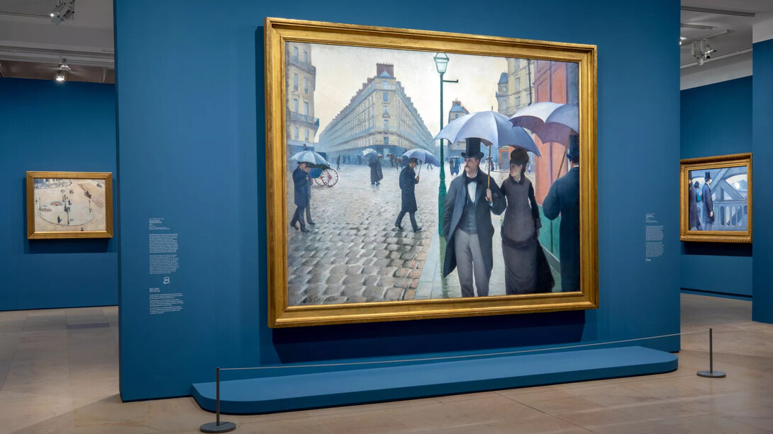 Gustave Caillebotte, Pintar hombres, vista de exhibición. Cortesía del Museo de Orsay